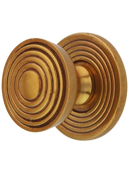 Copernicus Cabinet Knob with Back Plate - 1 1/8 inch Diameter in Paris Brass.